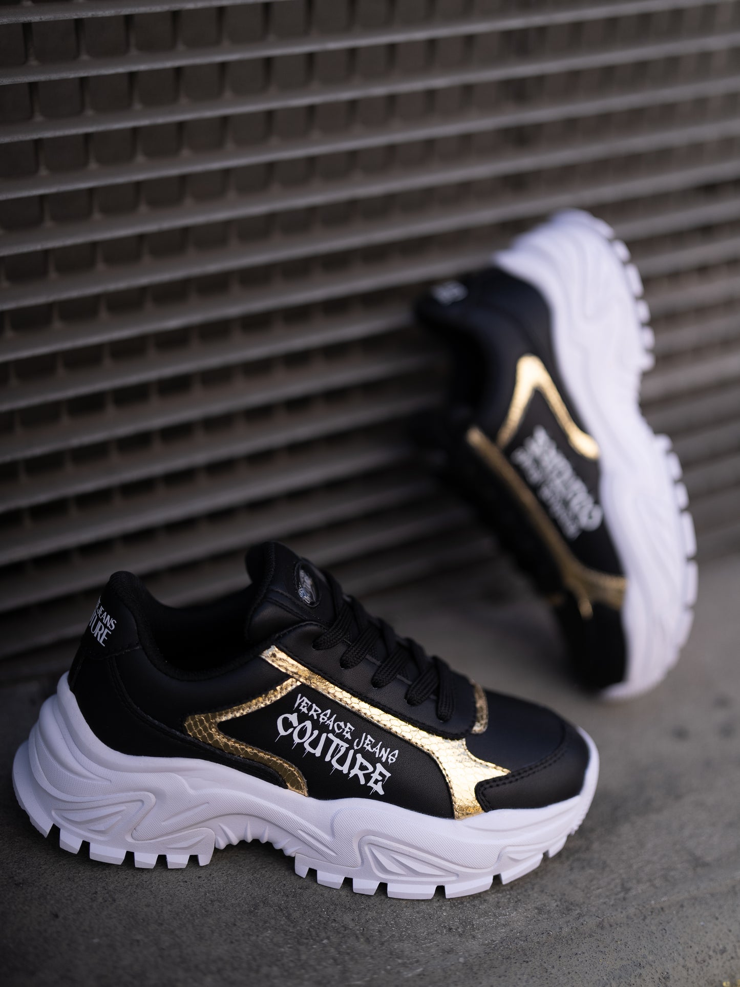 Black and gold sneaker