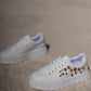 White sneakers with bejewelled gemstones