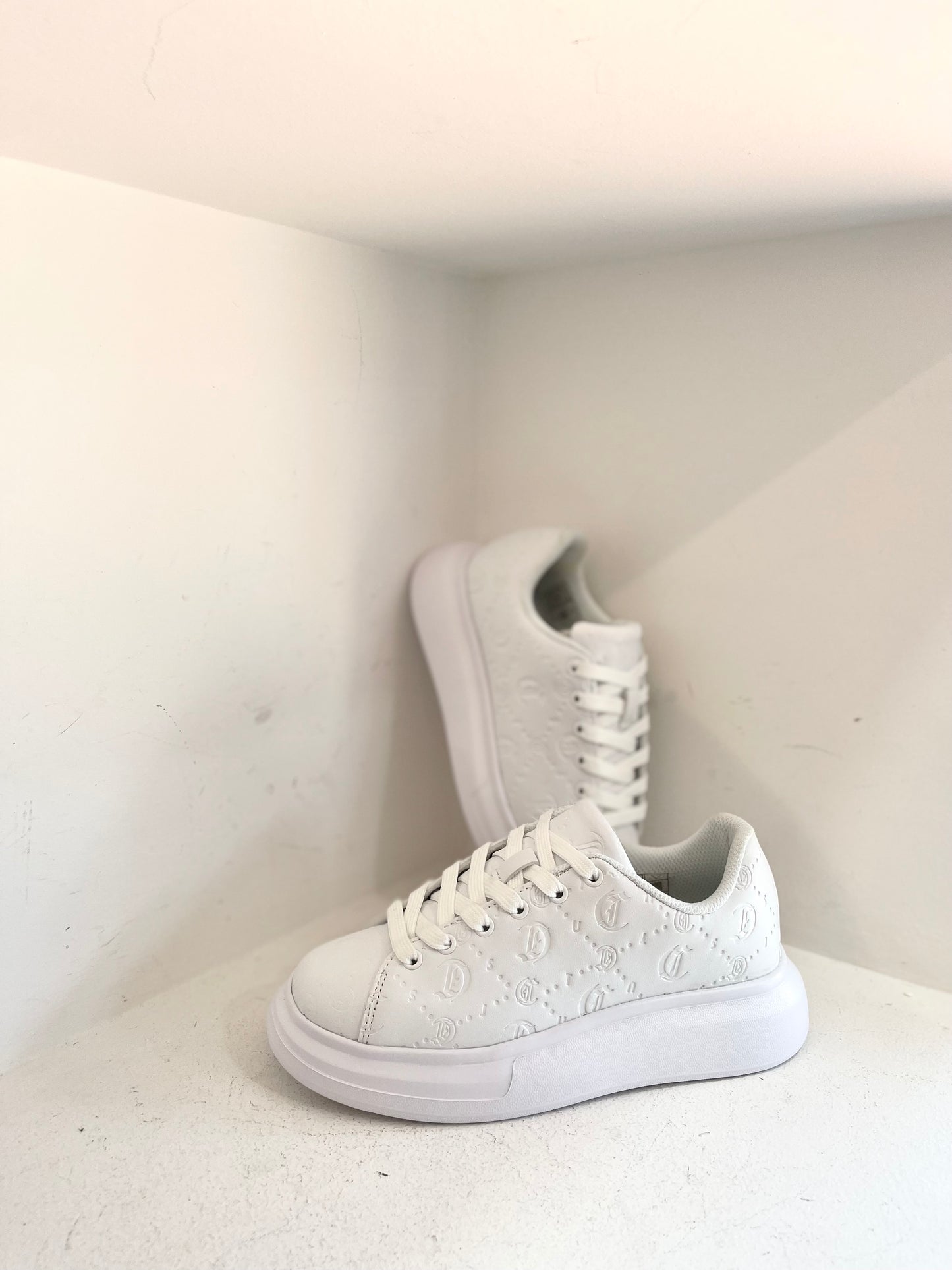 White embrossed sneaker