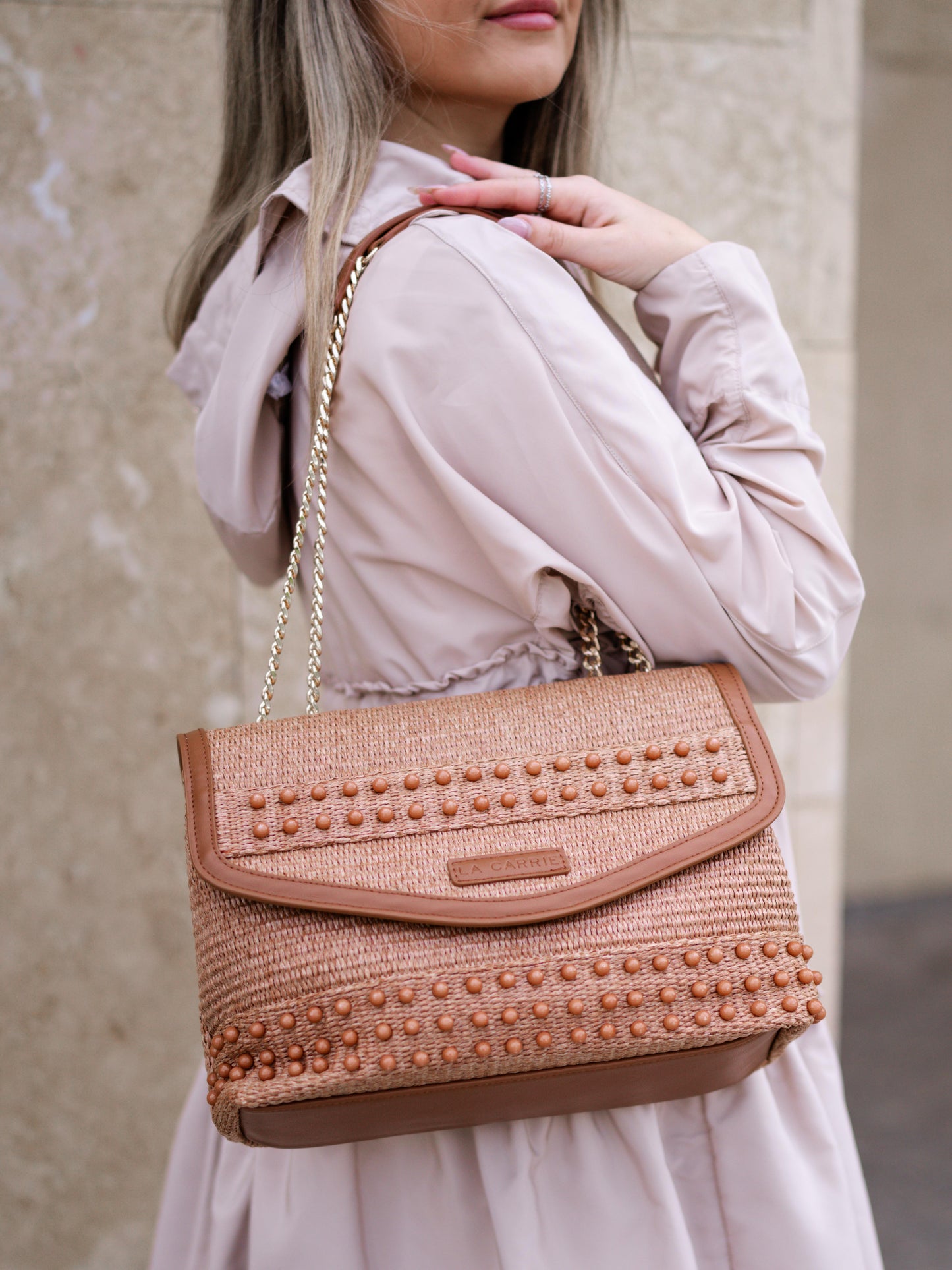 Brown handbag with a double strap