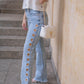 Calça jeans com detalhes