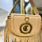 Nude fringes purse