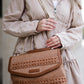 Brown handbag with a double strap