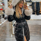 Padded black jacket with white fur