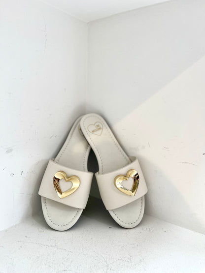 White mule with gold heart