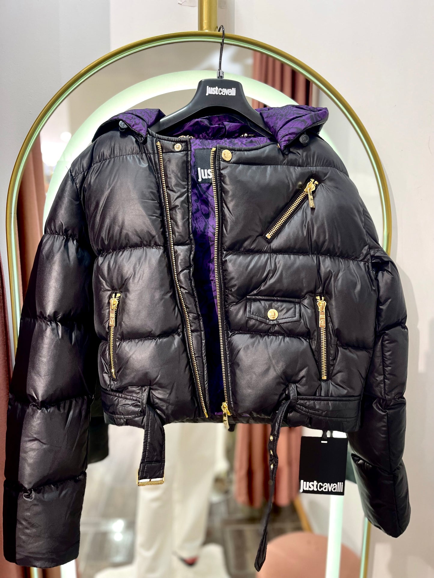 Black puffer jacket with purplw detail