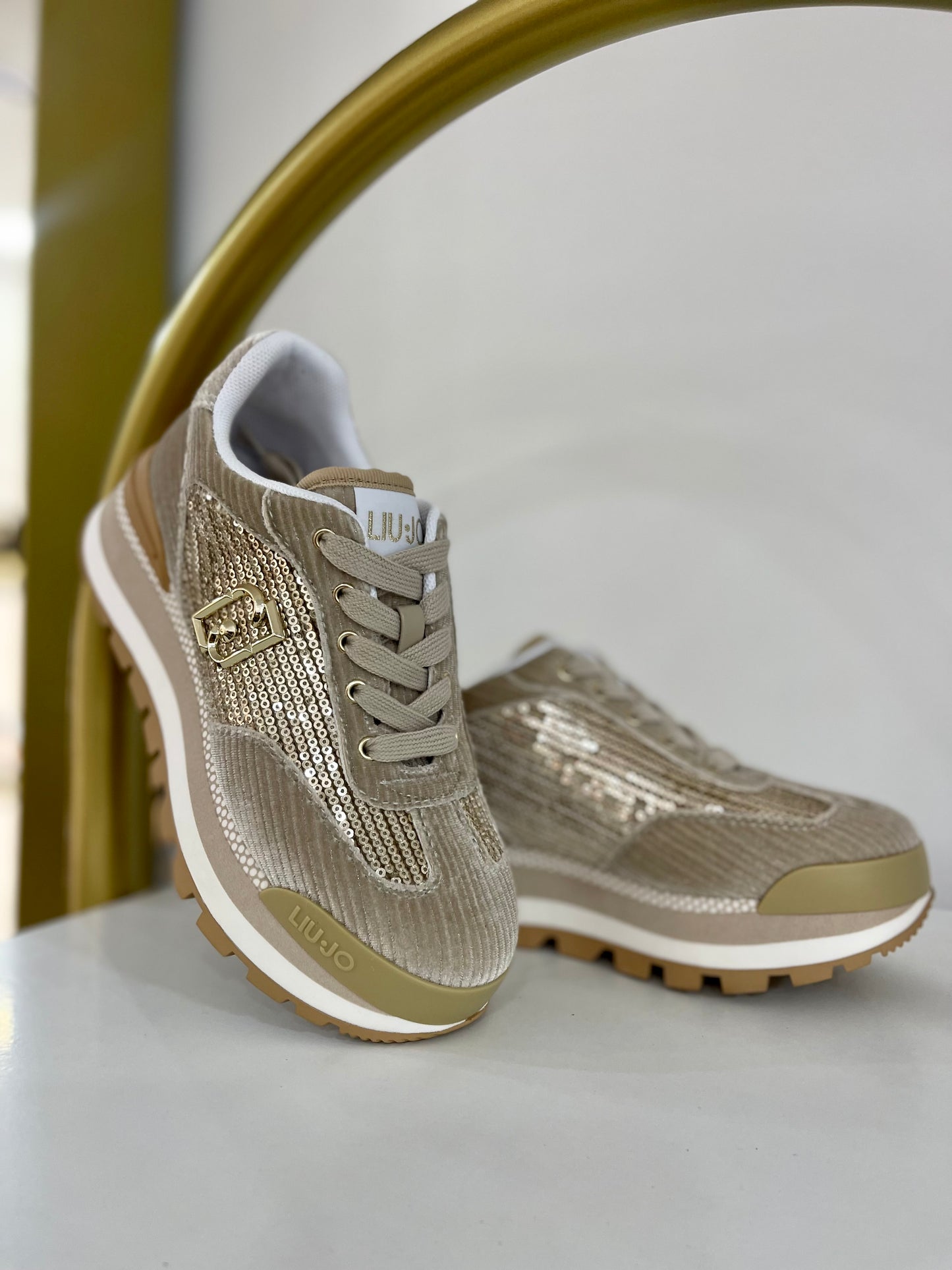 Gold  sneakers with all-over rhinestones