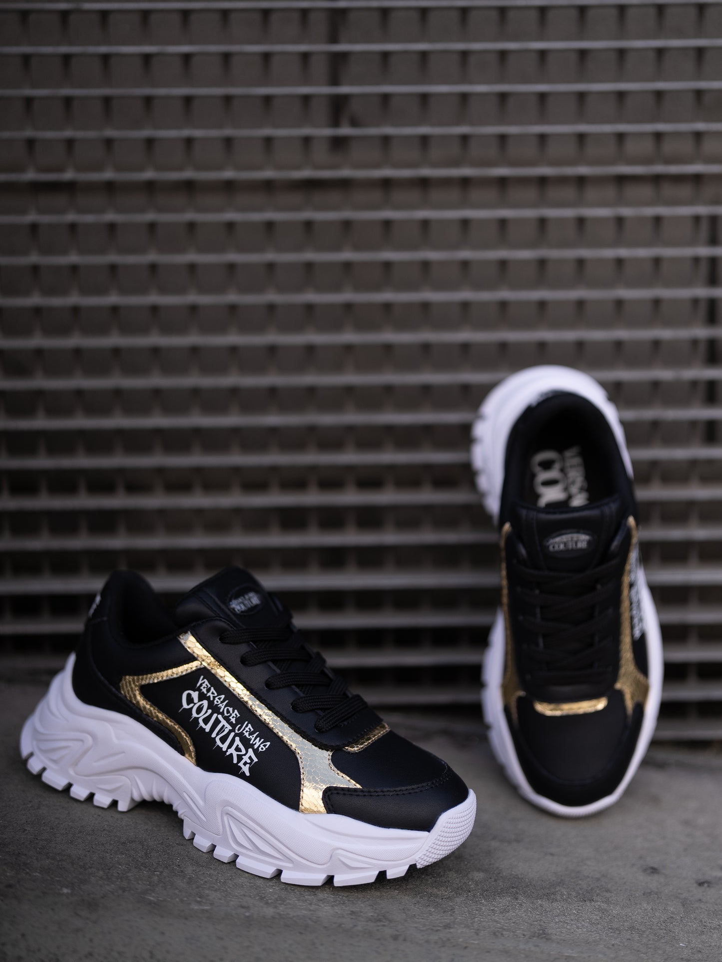 Black and gold sneaker