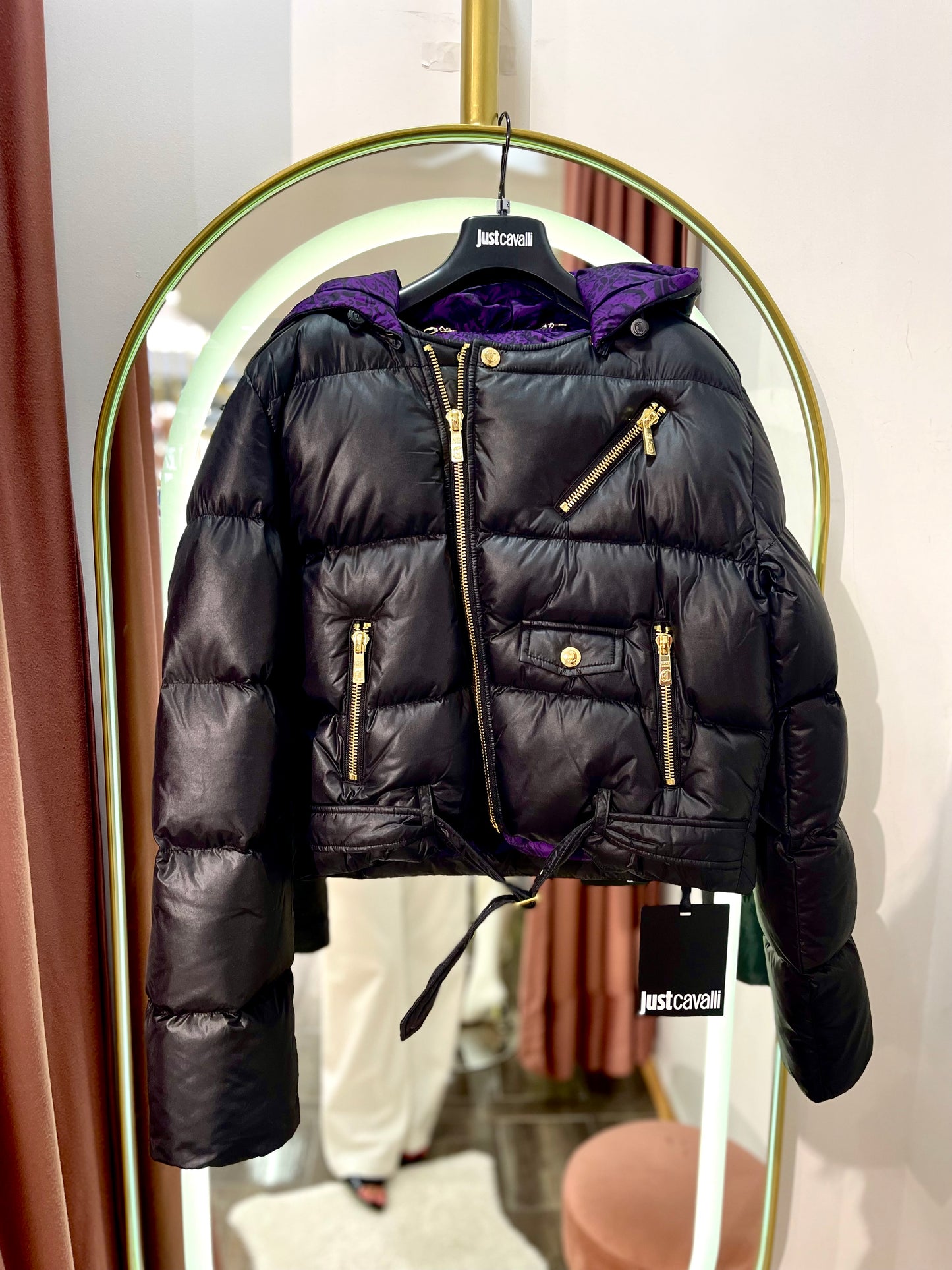 Black puffer jacket with purplw detail