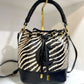 Zebra straw bucket purse