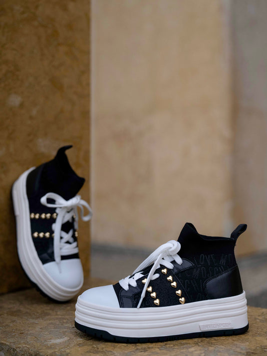 Black sneaker with double platform