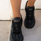 Black sneakers with all-over rhinestones