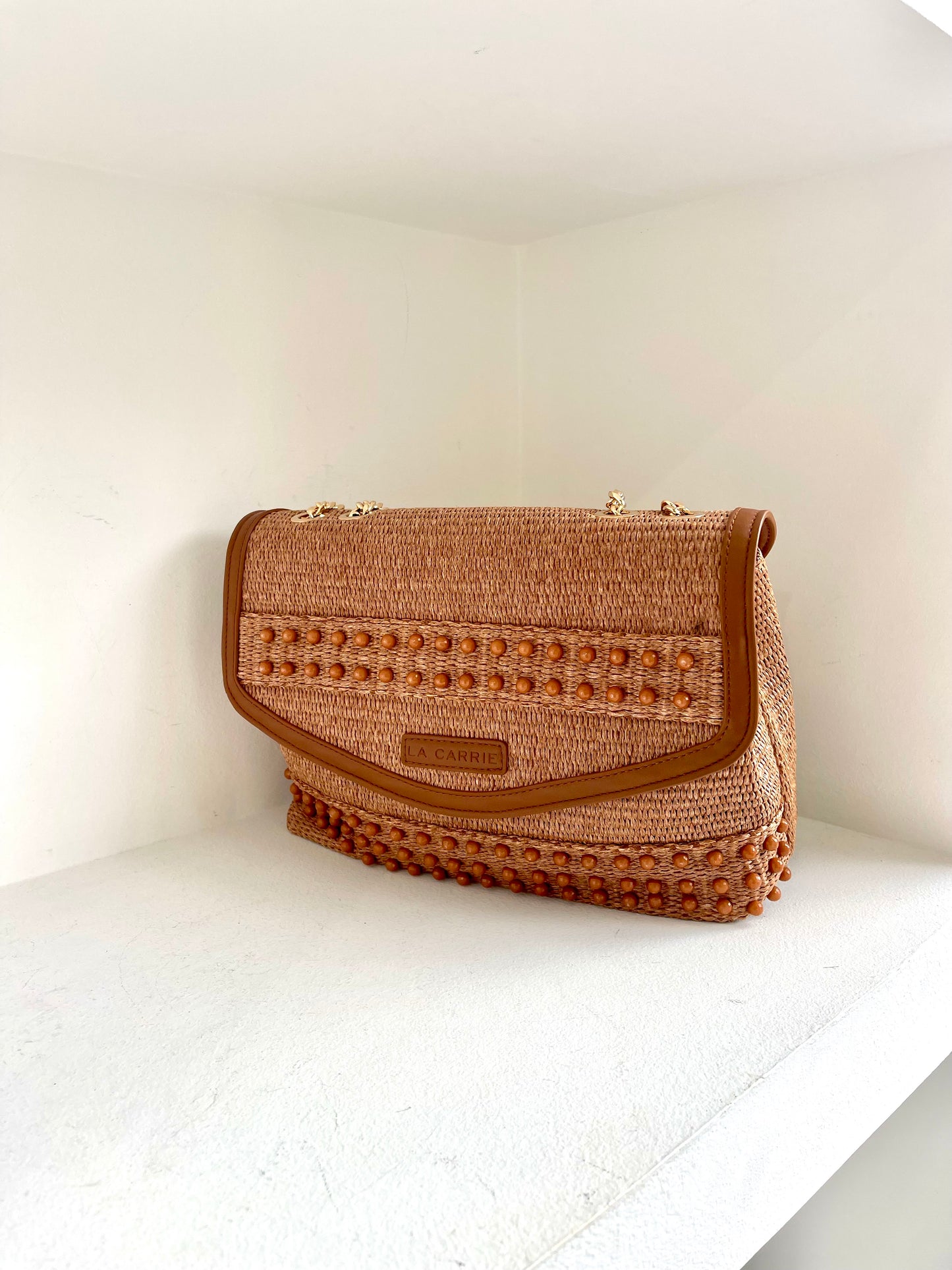 Brown handbag with a double strap