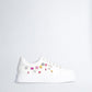 White sneakers with bejewelled gemstones