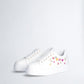 White sneakers with bejewelled gemstones