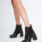 Black ankle boots with micro-sequins