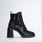 Black ankle boots with micro-sequins