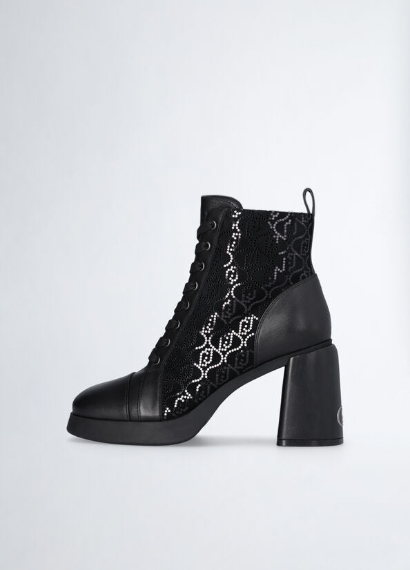 Black ankle boots with micro-sequins