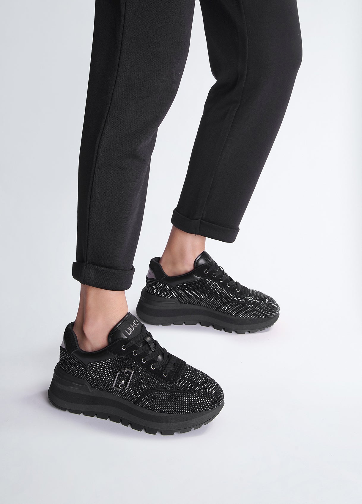 Black sneakers with all-over rhinestones