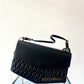 Plisse black handbag