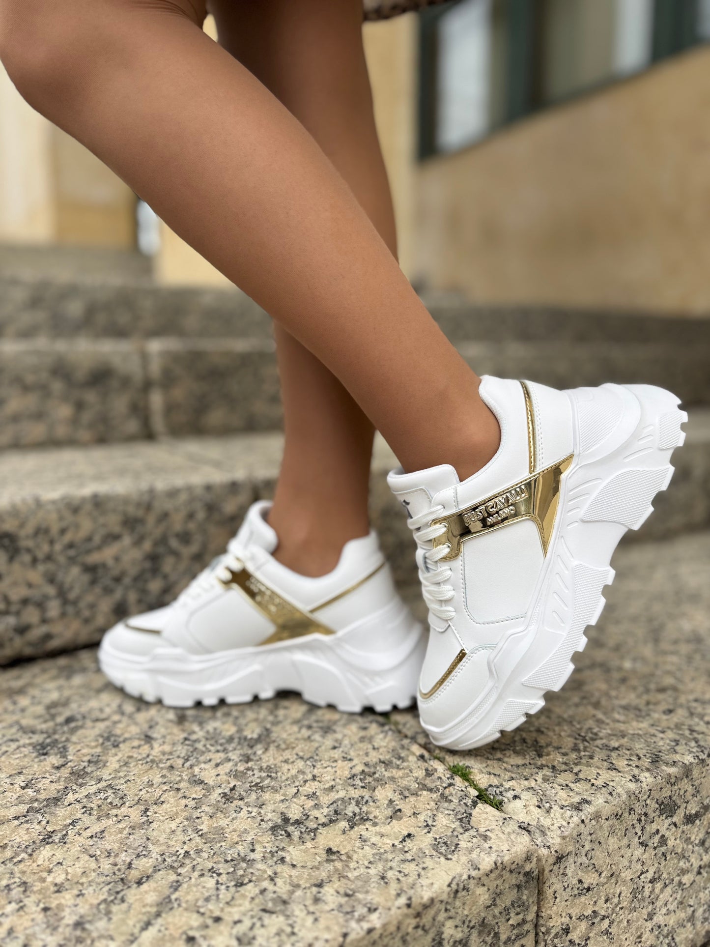 White and gold sneaker