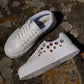 White sneakers with bejewelled gemstones