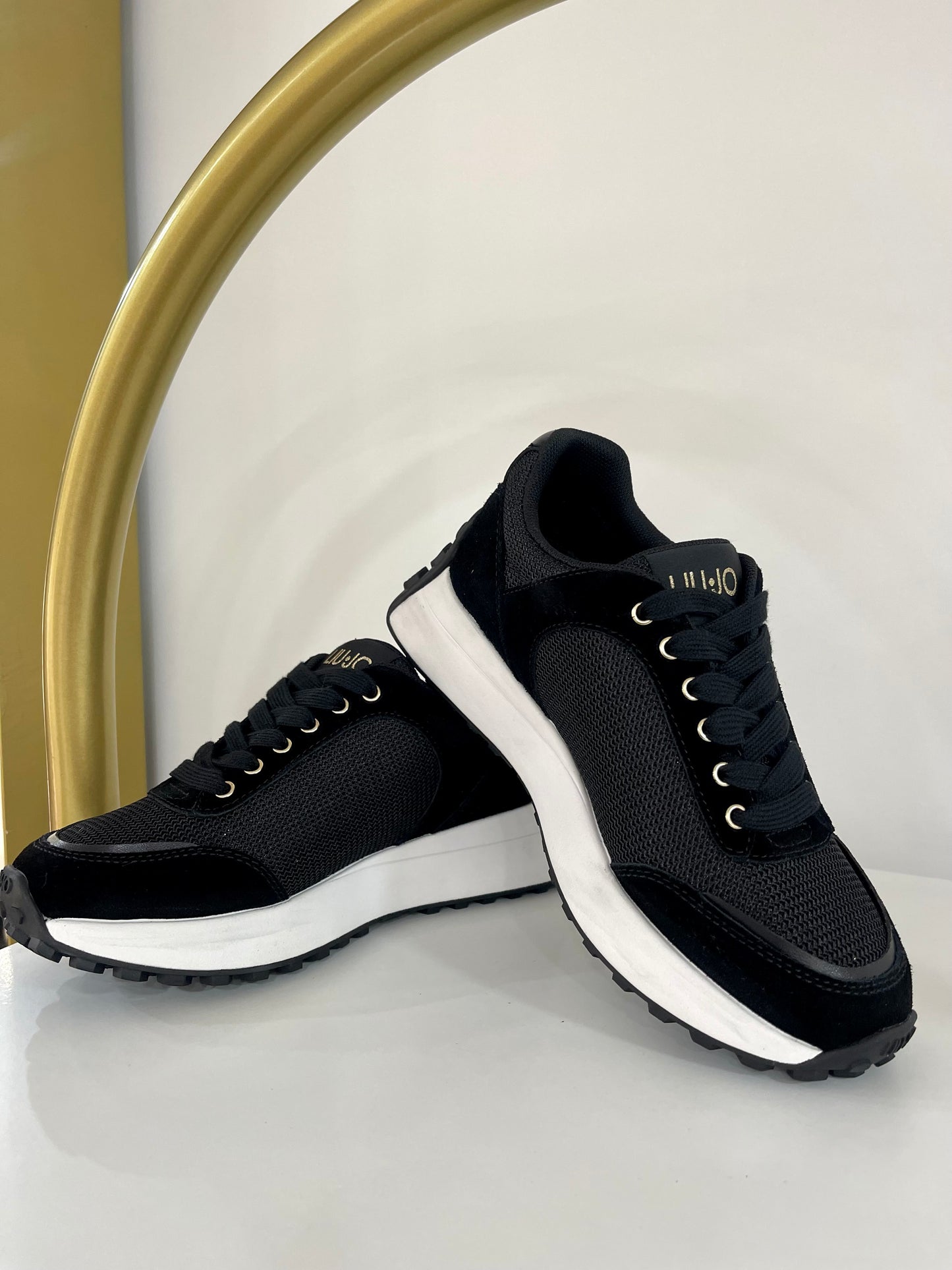 Suede and nylon running shoes