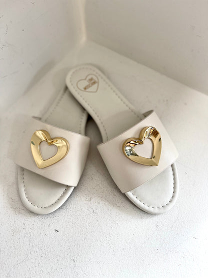 White mule with gold heart