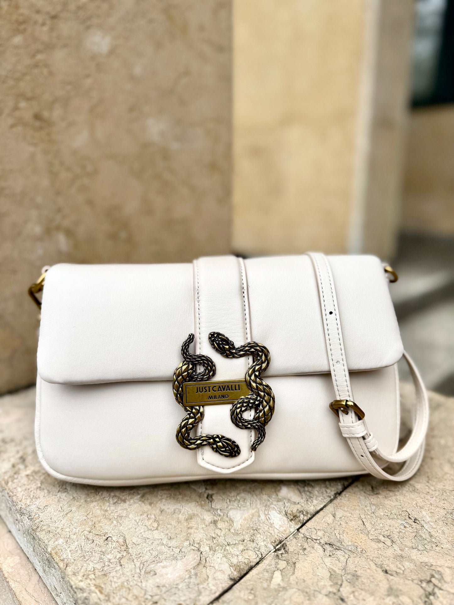 Snake-appliqué crossbody bag