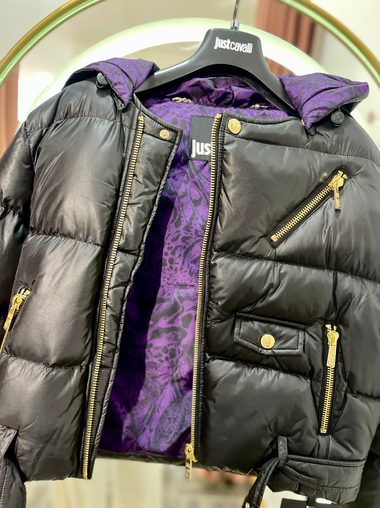 Black puffer jacket with purplw detail