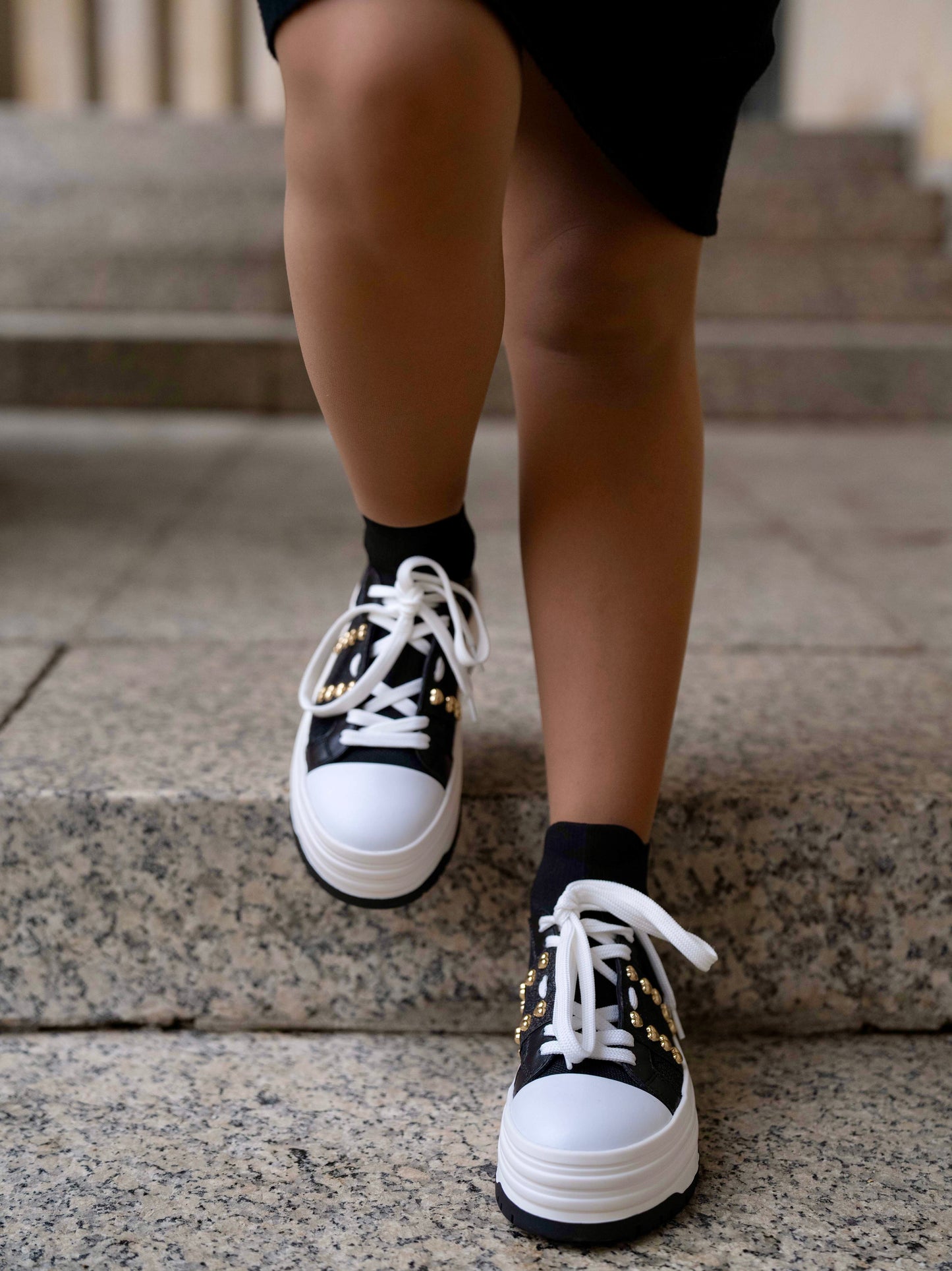 Black sneaker with double platform