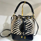 Zebra straw bucket purse