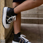 Black sneaker with double platform