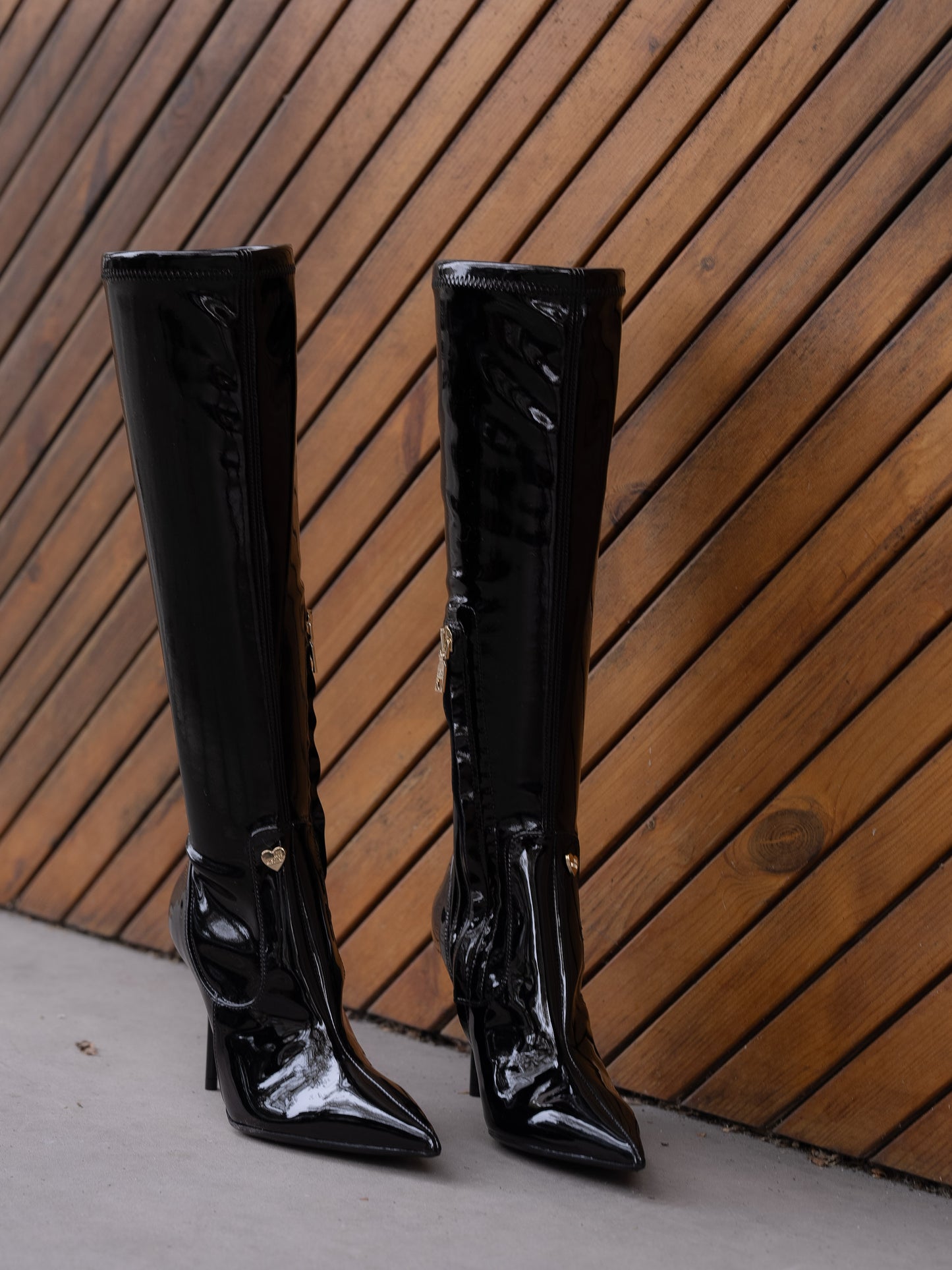 Black latex black boot