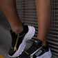 Black and gold sneaker