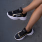 Black and gold sneaker