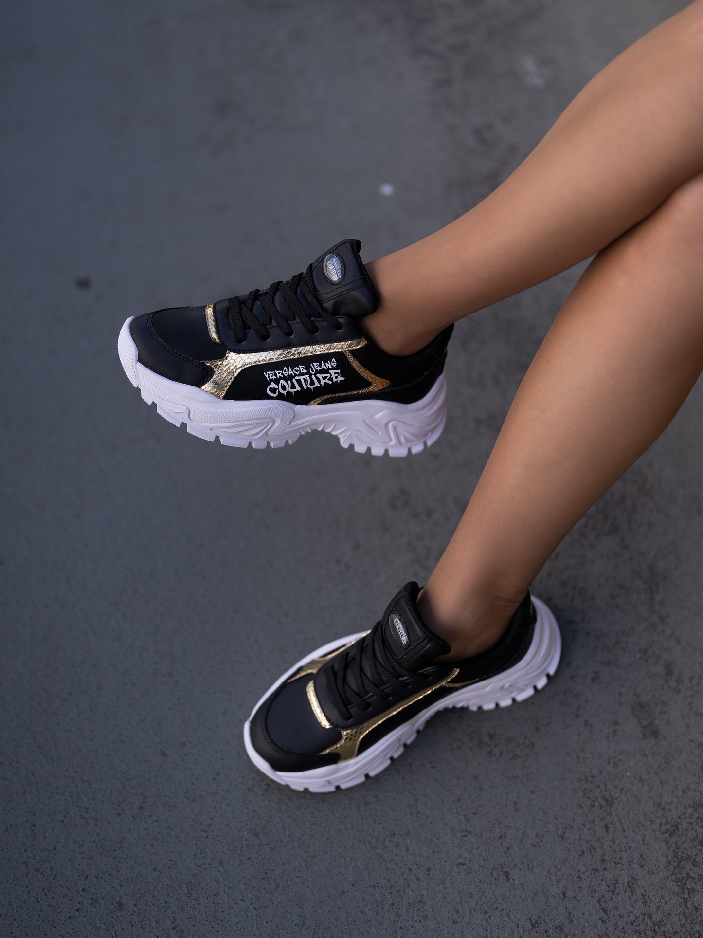 Black and gold sneaker