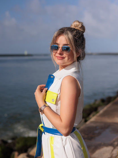 White dress with blue and green details